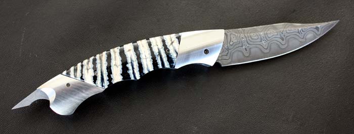 Custom handcrafted switchblades and stilettos